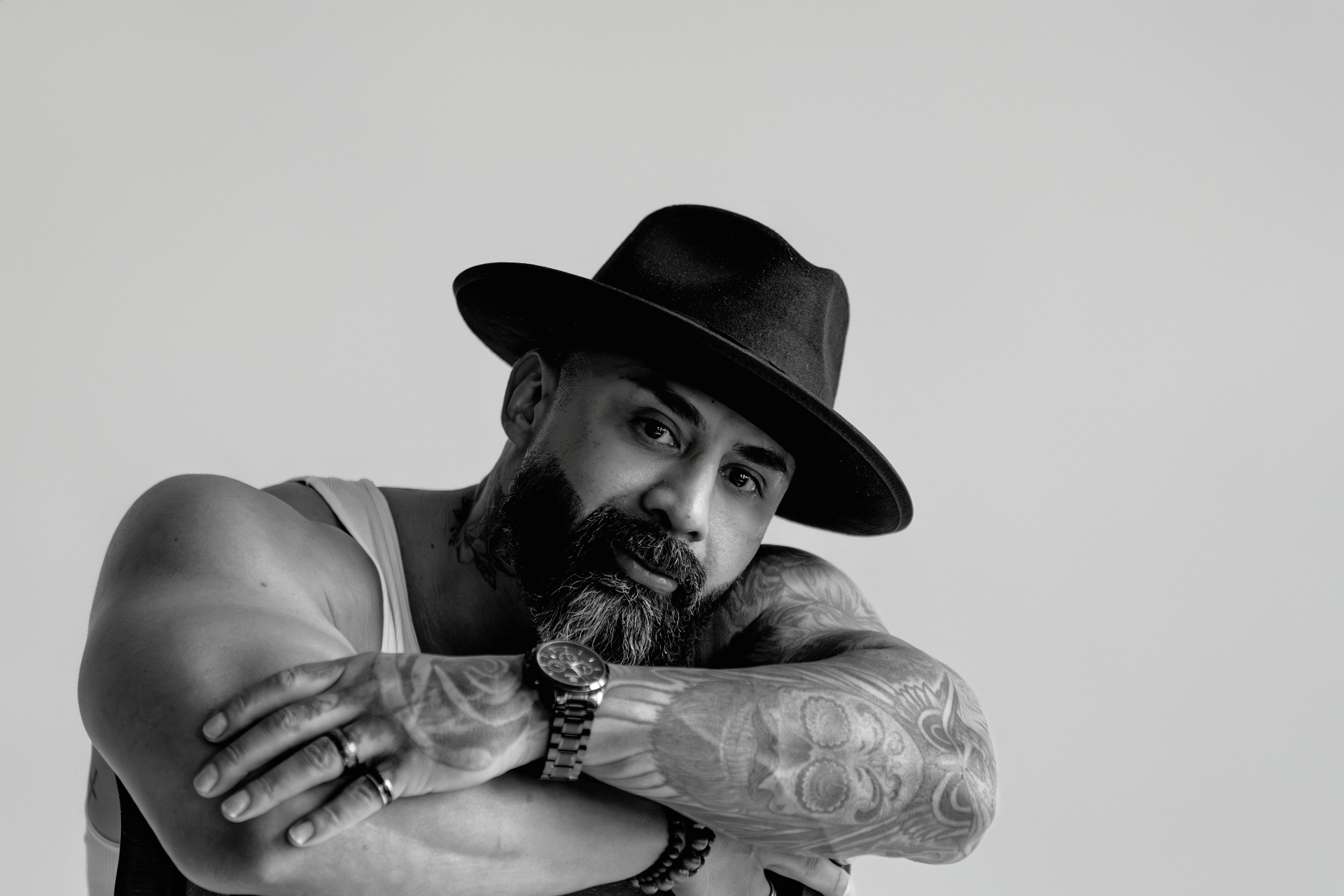 Black and white portrait with fedora
