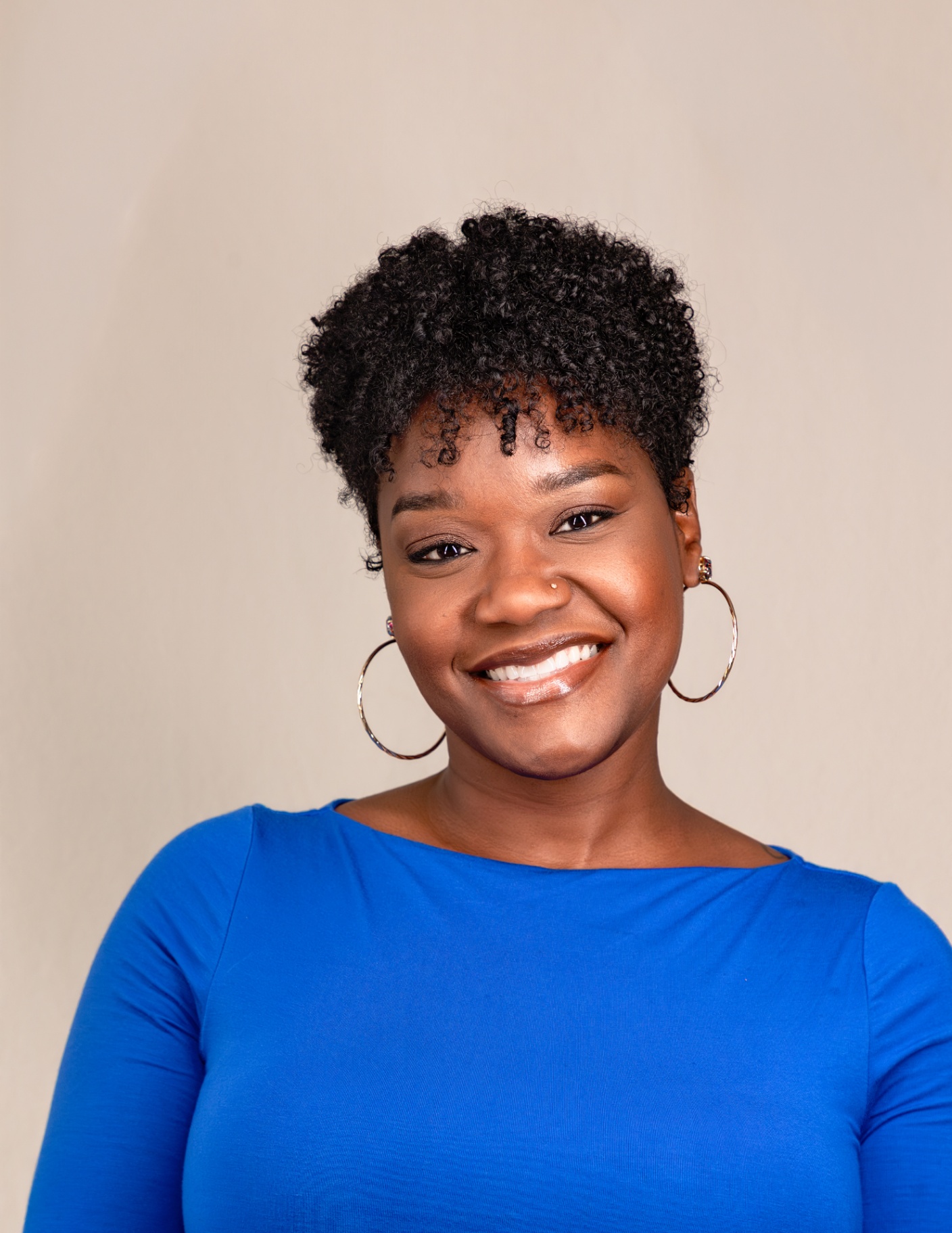 Professional headshot smiling